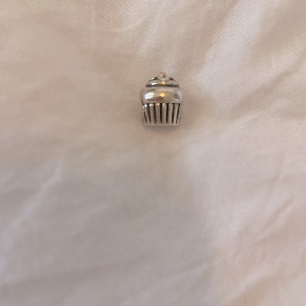 Pandora cupcake birthday charm with 14 karat gold